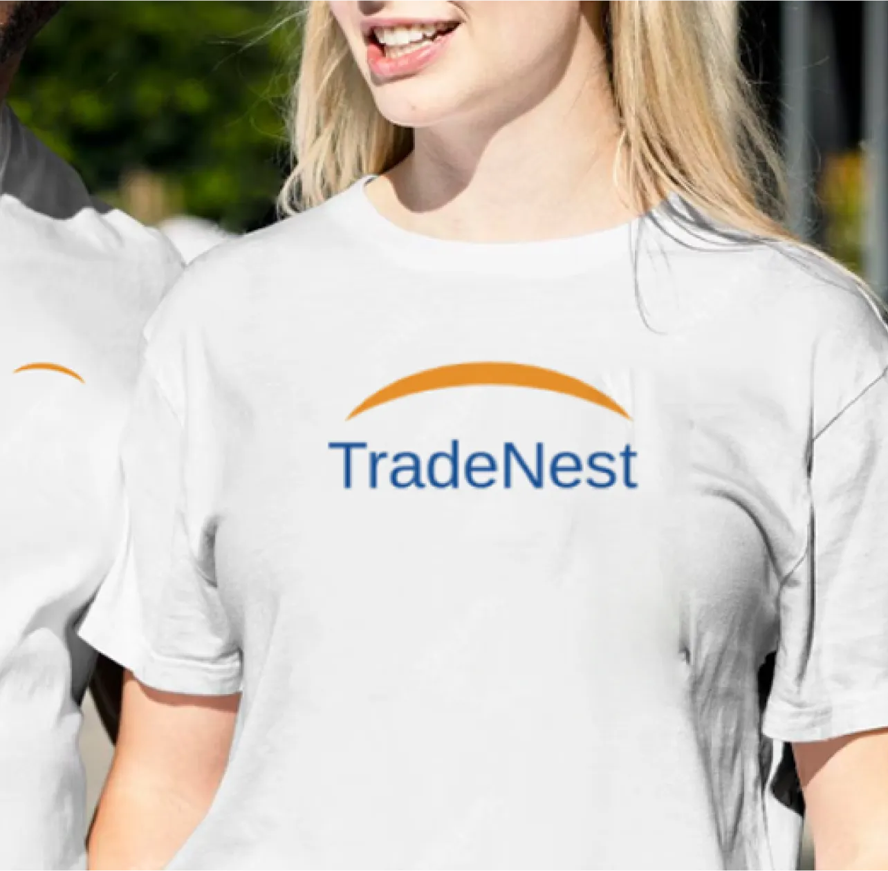 TradeNest logo printed on t-shirt showing merchandise branding application
